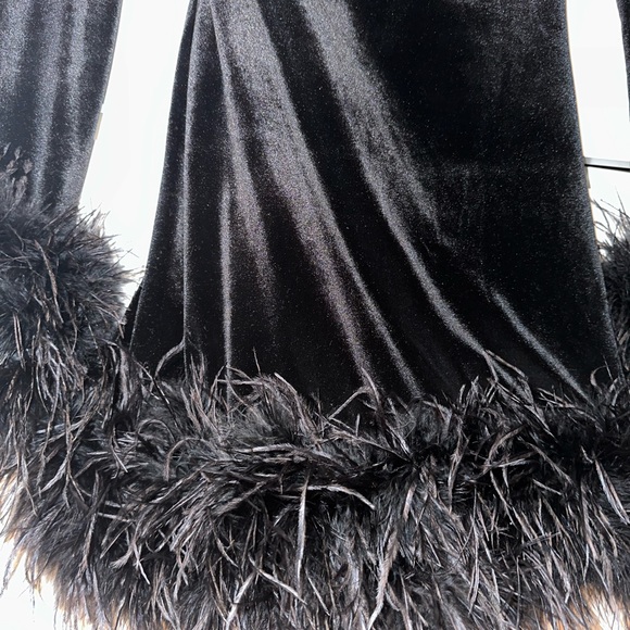 House of CB black velvet mini dress with feathers on cuffs and bottom - Picture 3 of 5